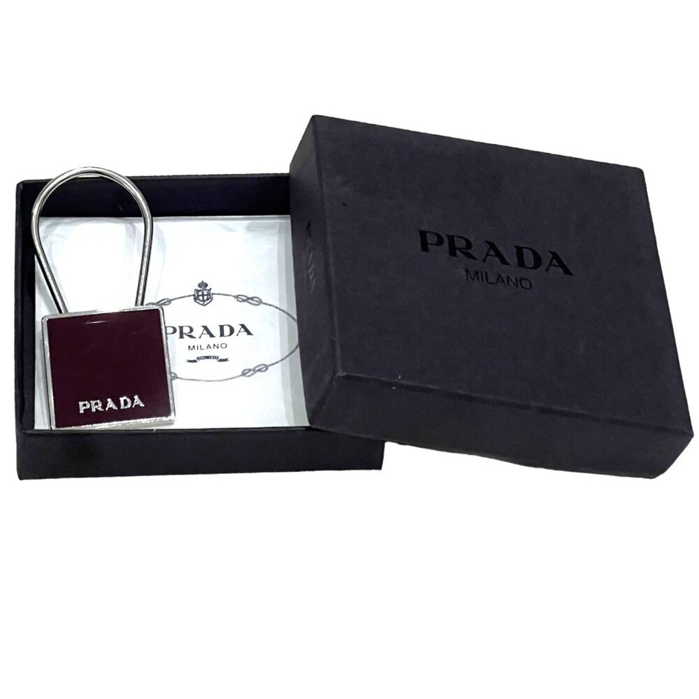 PRADA: Silver Metal & Burgundy Enamel Logo Bag Charm/Keychain #12029